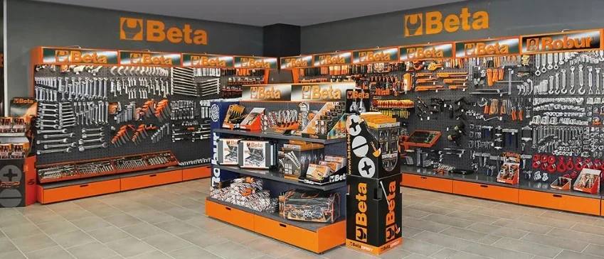 A GBI Proal showroom, with professional hand tools displayed on racks and a central stand.